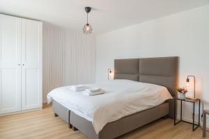 Postelja oz. postelje v sobi nastanitve MAISON ROBERT