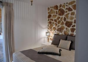 Кровать или кровати в номере Marikos House, Pyrgaki Alyko Naxos