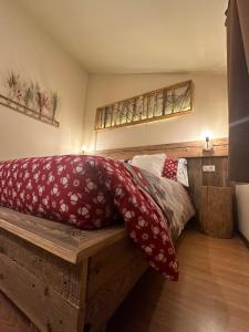 Voodi või voodid majutusasutuse Hotel Le Clou toas