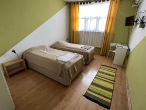Postel nebo postele na pokoji v ubytování Oleander Rooms & Apartment