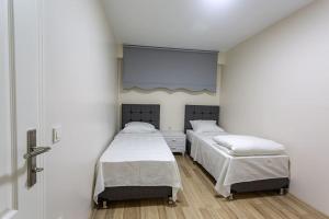 Ein Bett oder Betten in einem Zimmer der Unterkunft Lamartin
