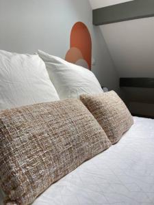 Postel nebo postele na pokoji v ubytování La Bohème