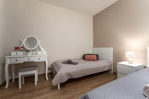 Postel nebo postele na pokoji v ubytování Apartments Nevenka