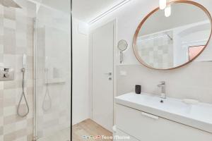 a bathroom with a sink and a mirror at Nonna Pina in Volastra