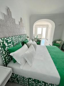 Cama ou camas em um quarto em Hotel Il Gabbiano