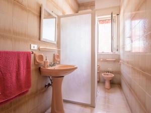 A bathroom at Studio Seccagrande by Interhome