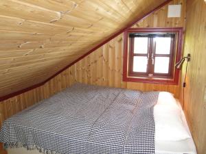 Postel nebo postele na pokoji v ubytování Holiday Home Troll by Interhome