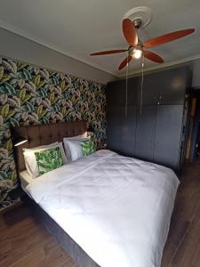 Ένα ή περισσότερα κρεβάτια σε δωμάτιο στο Beach Front Apartment