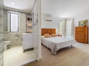 Ένα ή περισσότερα κρεβάτια σε δωμάτιο στο Villa Nacho