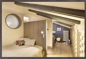 En eller flere senge i et værelse på sui tetti di bologna + 4 billeder