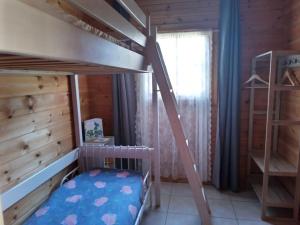 Posteľ alebo postele v izbe v ubytovaní Chalet au calme cœur du LOT