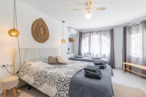 Postel nebo postele na pokoji v ubytování Verano Eterno + 23 fotografií