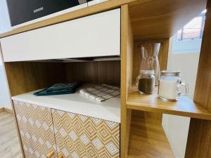 Kuchyňa alebo kuchynka v ubytovaní Appartement cosy centre-ville + 4 fotografie