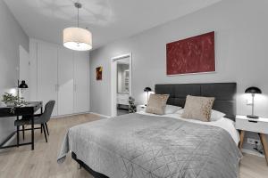 Postel nebo postele na pokoji v ubytování Tower Apartments