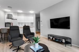 TV a/nebo společenská místnost v ubytování Tower Apartments