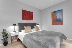 Postel nebo postele na pokoji v ubytování Tower Apartments