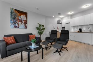 Kuchyň nebo kuchyňský kout v ubytování Tower Apartments