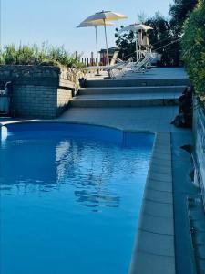 Bazén v ubytování Villino Rosanna , 5 minuti a piedi dal mare nebo v jeho okolí