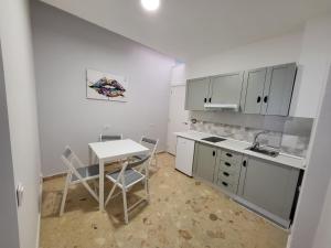 Kuchyň nebo kuchyňský kout v ubytování Resort Suites Vecindario