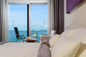 Krevet ili kreveti u jedinici u okviru objekta Hotel Split