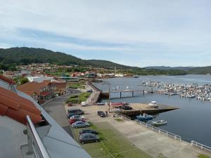 a view of a marina with boats in the water at Casa Adrián in Sabardes