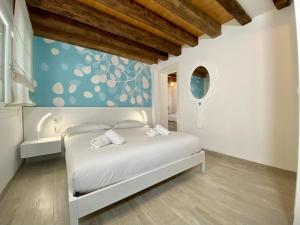 A bed or beds in a room at Residence Stella