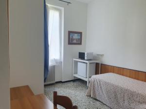 Voodi või voodid majutusasutuse Hotel Zoagli toas