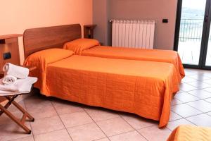 Cama o camas de una habitación en Fontanarosa Residence
