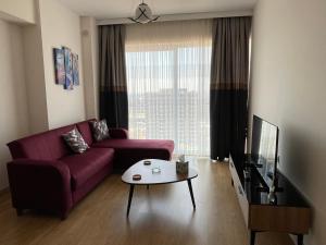 Posezení v ubytování Cozy Modern APT Kepez, Antalya