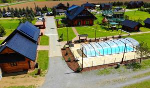 The swimming pool at or close to Ubytovanie Koliba Pacho - Zrub Zuzka