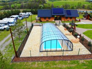 The swimming pool at or close to Ubytovanie Koliba Pacho - Zrub Zuzka
