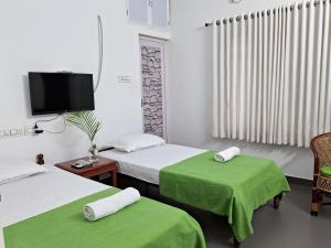 Postel nebo postele na pokoji v ubytování Mi Casa Tu Casa Homestay
