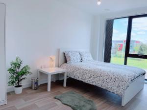 Postel nebo postele na pokoji v ubytování Modern House