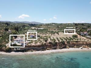 an aerial view of a resort on a beach at Seaside 2 in Kómboi
