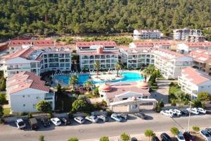 an aerial view of a resort with a pool at AKBÜK Palace Resıdence in Didim