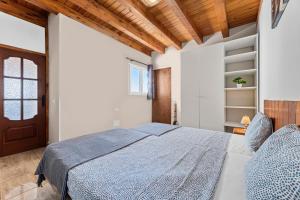 Posteľ alebo postele v izbe v ubytovaní E Ensuite Vacation Apartment LANZAROTE