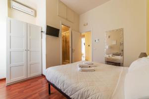 A bed or beds in a room at 4-rooms flat at Vatican
