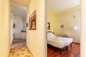 A bed or beds in a room at 4-rooms flat at Vatican