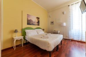 A bed or beds in a room at 4-rooms flat at Vatican