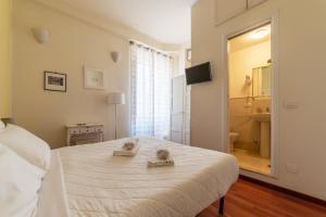 A bed or beds in a room at 4-rooms flat at Vatican