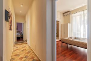 A bed or beds in a room at 4-rooms flat at Vatican