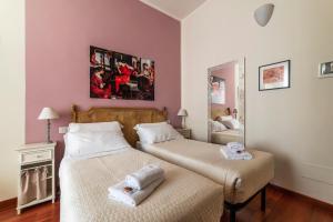 A bed or beds in a room at 4-rooms flat at Vatican