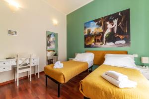 A bed or beds in a room at 4-rooms flat at Vatican