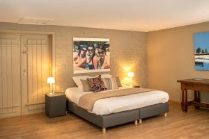 Postel nebo postele na pokoji v ubytování Guesthouse Brouwershuis