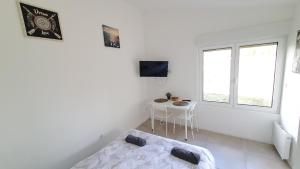 Posteľ alebo postele v izbe v ubytovaní R10 Idéal déplacement pro