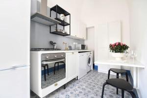 O bucătărie sau chicinetă la iFlat Dimora del Cassaro