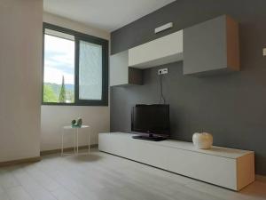 TV a/nebo společenská místnost v ubytování Casa ToNi