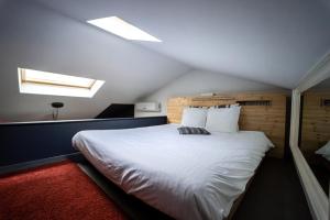 Postel nebo postele na pokoji v ubytování Le Lov't - Suite avec jacuzzi