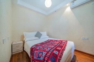 Ένα ή περισσότερα κρεβάτια σε δωμάτιο στο Yue Ke Apartment - Changbin Road Branch