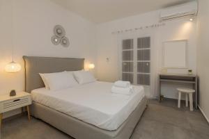 Postel nebo postele na pokoji v ubytování Marvelous One Bedroom House In Paros